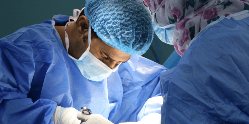 Doctors conducting surgery
